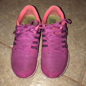 Pink and coral Nike’s women free runs 5.0